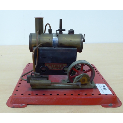 166 - A Mamod stationary steam engine; and two model kits