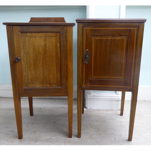 17 - Two similar Edwardian, string and ebony inlaid, mahogany bedside single door cabinets, raised on squ... 