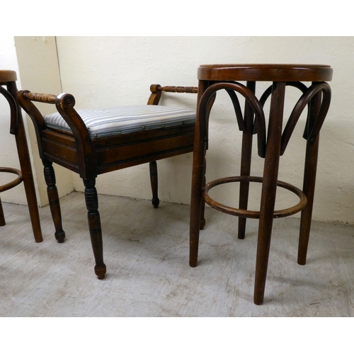 179 - Small furniture, viz. an Edwardian mahogany music stool with a box top and flank handles; and a set ... 