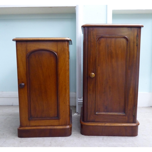 18 - Two similar late Victorian, mahogany single door bedside cupboards, on a plinth  30