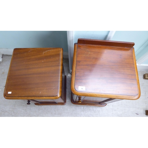 18 - Two similar late Victorian, mahogany single door bedside cupboards, on a plinth  30