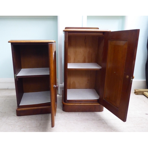 18 - Two similar late Victorian, mahogany single door bedside cupboards, on a plinth  30