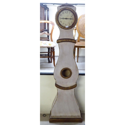 184 - A 19thC French style waisted, painted and gilded longcase clock; the movement faced by an Arabic dia... 