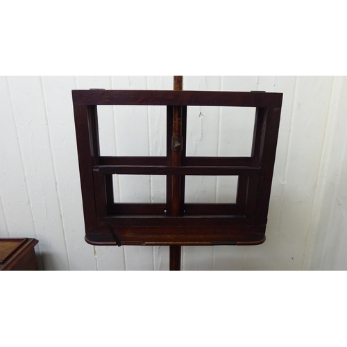 186 - A late Victorian mahogany duet music stand, raised on a height adjustable pillar and circular foot&n... 