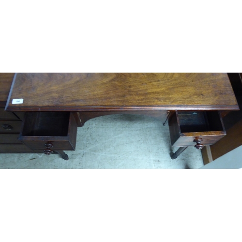 196 - An early Victorian mahogany kneehole writing table, comprising a pair of drawers with bun handles, r... 