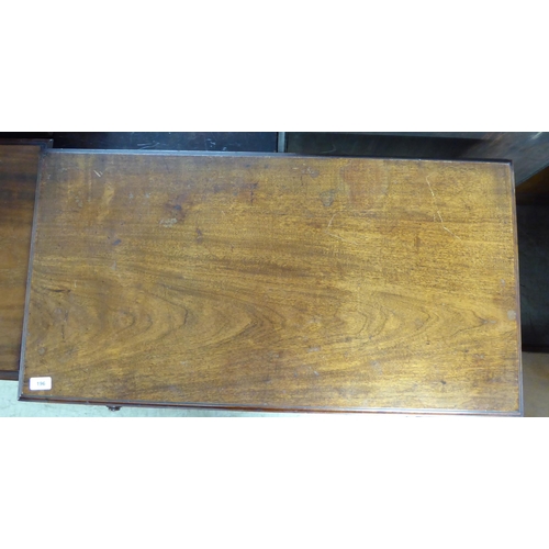 196 - An early Victorian mahogany kneehole writing table, comprising a pair of drawers with bun handles, r... 