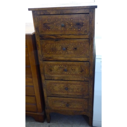 216 - A late 19thC French walnut and profusely inlaid tallboy, comprising five graduated long drawers betw... 