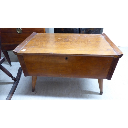 218 - Small furniture: to include a 19thC unfitted, mahogany cellarette, raised on square, tapered legs an... 