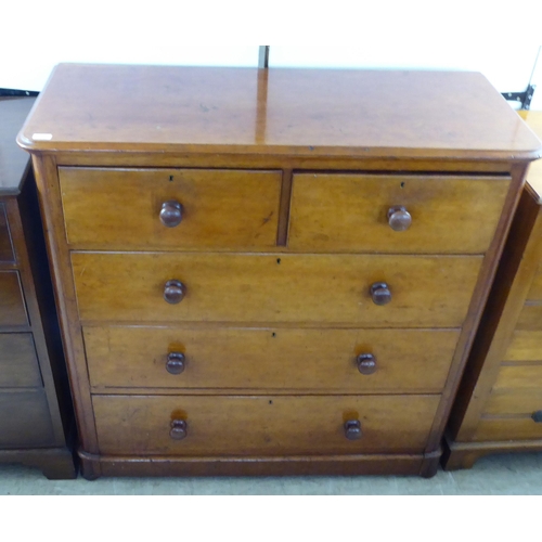 221 - A late Victorian satin mahogany dressing chest with two short/three graduated long drawers, on a pli... 