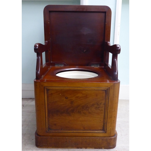 23 - A late Victorian mahogany night commode with straight sides and a hinged lid, on a plinth  17