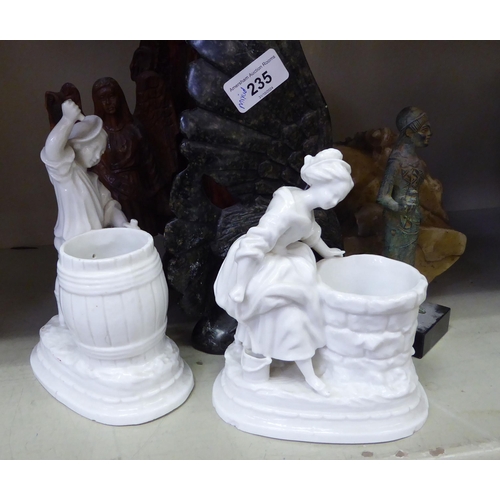 235 - A mixed lot: to include religious themed, carved wooden items