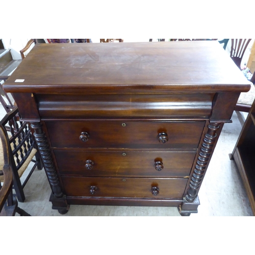 256 - A late Victorian mahogany dressing room chest, comprising four long drawers between spiraltwist, fla... 