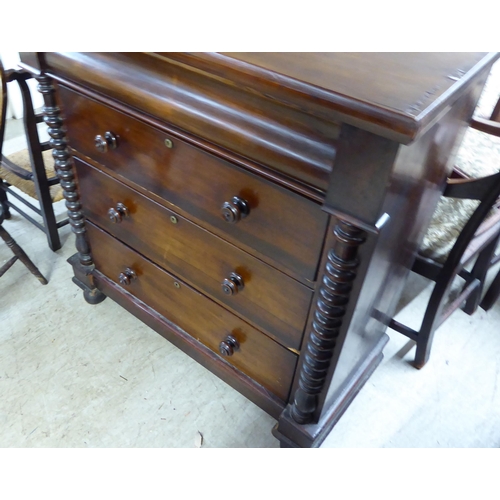 256 - A late Victorian mahogany dressing room chest, comprising four long drawers between spiraltwist, fla... 