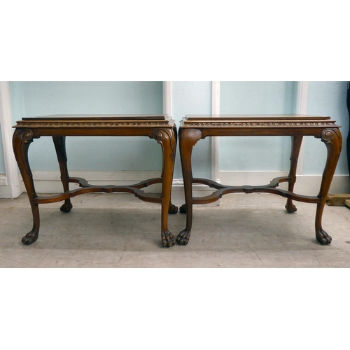 26 - A pair of modern Georgian reproduction, hardwood occasional tables with a stepped top, raised on cab... 