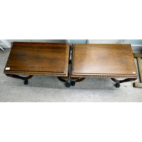 26 - A pair of modern Georgian reproduction, hardwood occasional tables with a stepped top, raised on cab... 