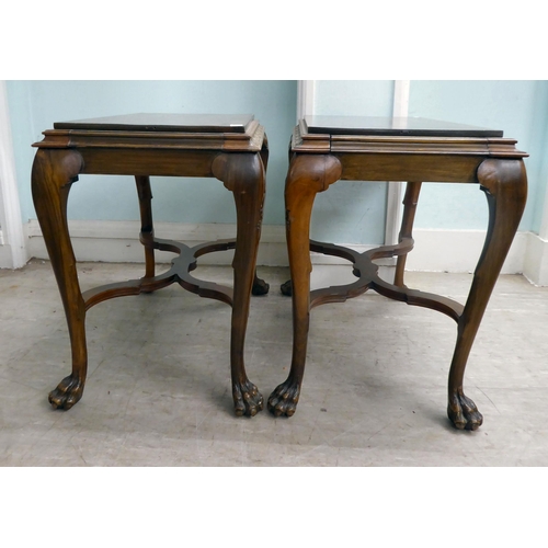 26 - A pair of modern Georgian reproduction, hardwood occasional tables with a stepped top, raised on cab... 