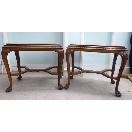 26 - A pair of modern Georgian reproduction, hardwood occasional tables with a stepped top, raised on cab... 