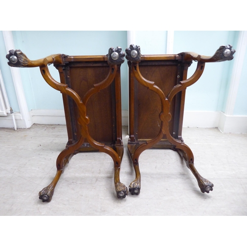 26 - A pair of modern Georgian reproduction, hardwood occasional tables with a stepped top, raised on cab... 