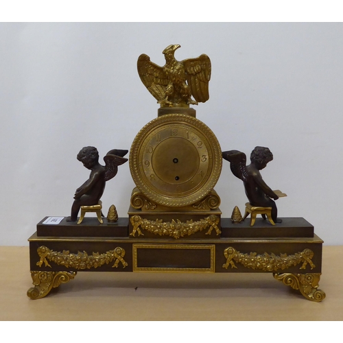 261 - An early 20thC French bi-coloured, cast metal mantel clock  14