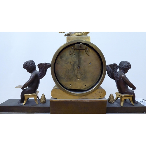 261 - An early 20thC French bi-coloured, cast metal mantel clock  14