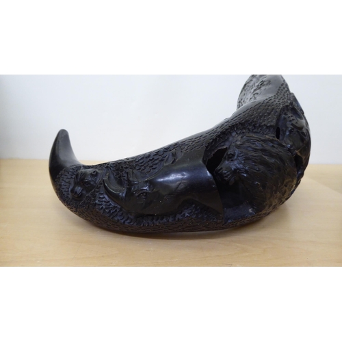 265 - A pair of carved and hollowed buffalo horns  15