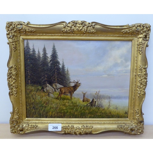 266 - Early 20thC European School - deers and a stag, on a hillside  oil on board  bears an indi... 