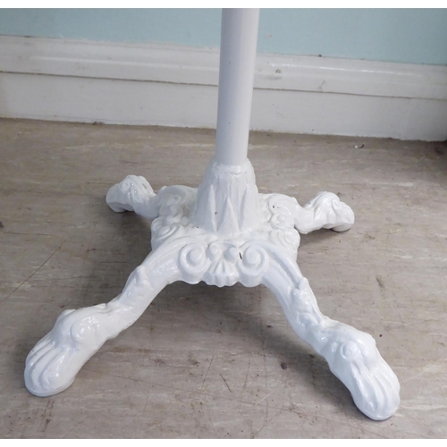 28 - A Victorian style, white painted, cast iron, pub style table with a marble top  28