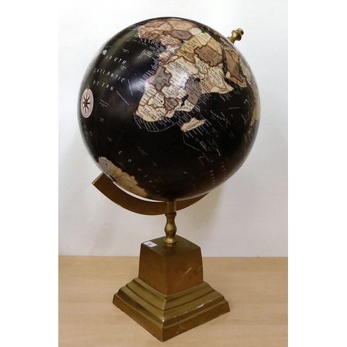 280 - A terrestrial globe, on a rotating support and stepped metal plinth  31