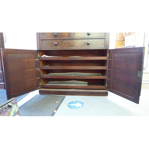 287 - A 19thC mahogany six drawer tall boy, raised on bracket feet  48