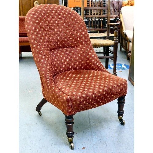 294 - A late 19thC rosewood framed and later red fabric upholstered nursing chair, raised on turned forele... 