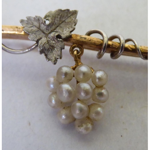 299 - A 15ct gold bar brooch, set with seed pearls