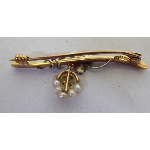 299 - A 15ct gold bar brooch, set with seed pearls