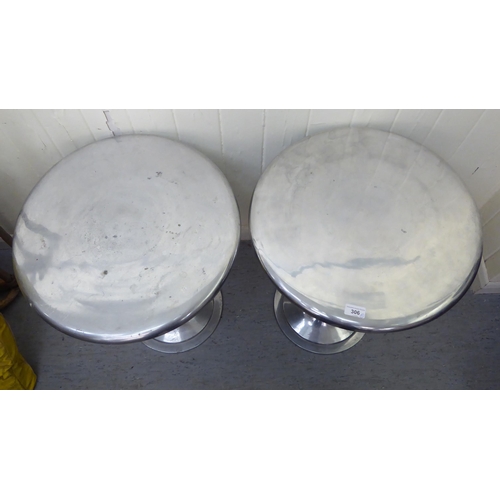 306 - A pair of modern cast metal, pedestal wine tables  26