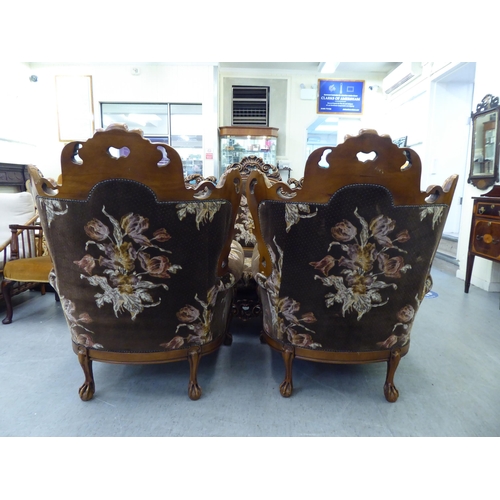 307 - A modern elaborate Italian influenced, carved and stained beech three piece suite  comprising a... 