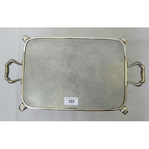 322 - An early 20thC silver plated plate warming stand, raised on cabriole legs  15