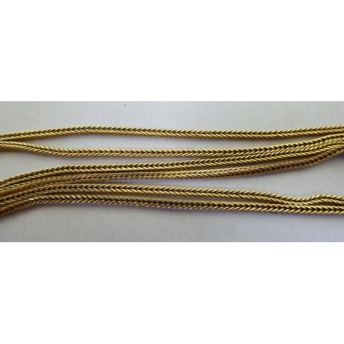 325 - A yellow metal neckchain  stamped Italy 750