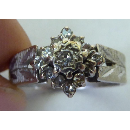 330 - An 18ct white gold diamond cluster ring