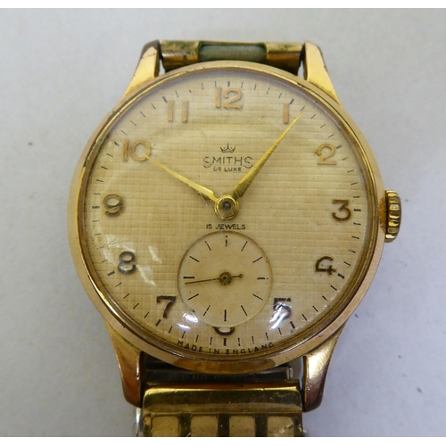 333 - A Smiths gold plated bracelet watch with manual wind, faced by an Arabic dial