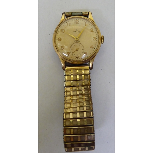 333 - A Smiths gold plated bracelet watch with manual wind, faced by an Arabic dial