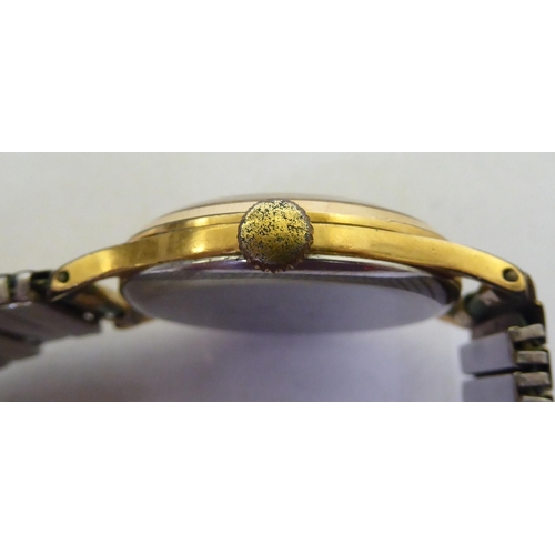 333 - A Smiths gold plated bracelet watch with manual wind, faced by an Arabic dial