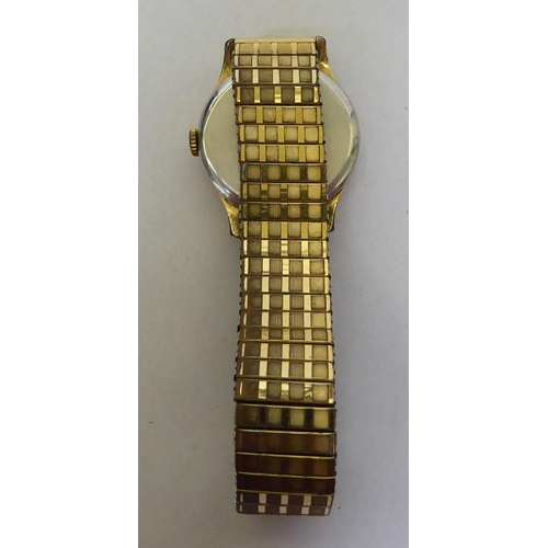 333 - A Smiths gold plated bracelet watch with manual wind, faced by an Arabic dial