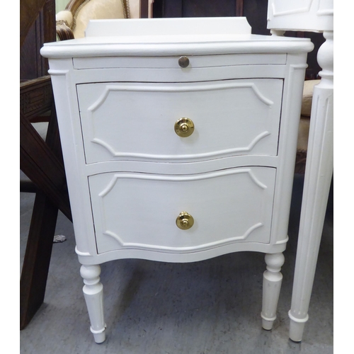 339 - A modern white painted bedroom suite, comprising a dressing table  65