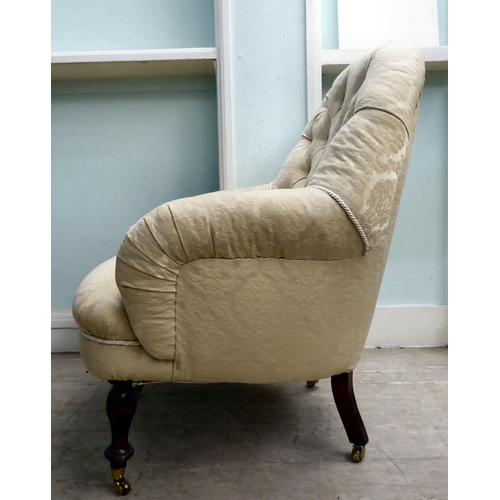 37 - A 20thC Victorian style, floral fabric pattern upholstered nursing chair, raised on turned beech leg... 