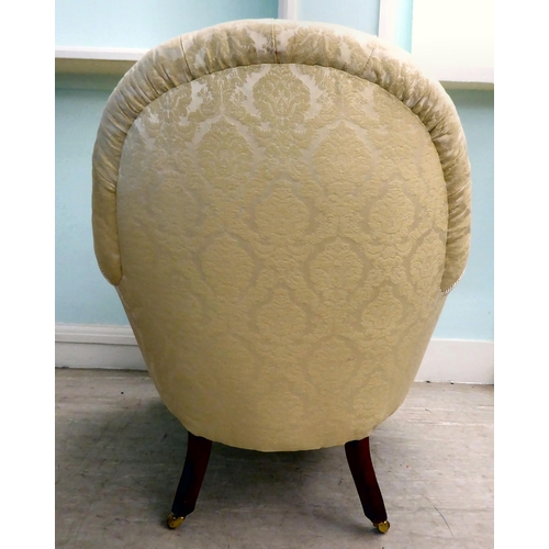 37 - A 20thC Victorian style, floral fabric pattern upholstered nursing chair, raised on turned beech leg... 