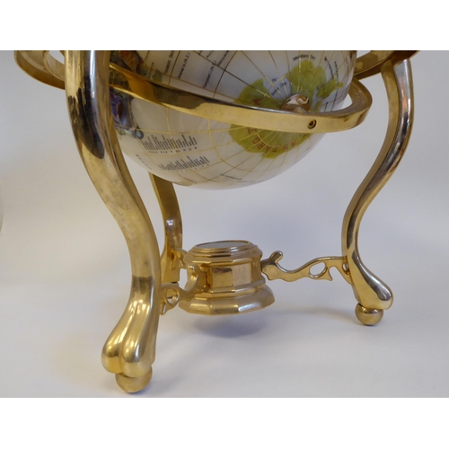 41 - A modern composition hardstone effect terrestrial globe, on a lacquered brass stand  15