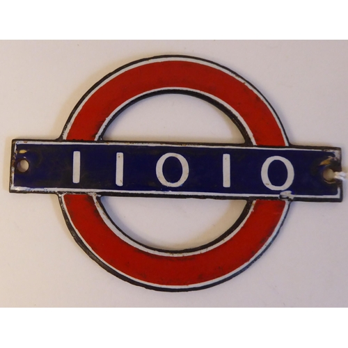 52 - A London Underground enamelled Bullseye plate from driving car 11010  3.75