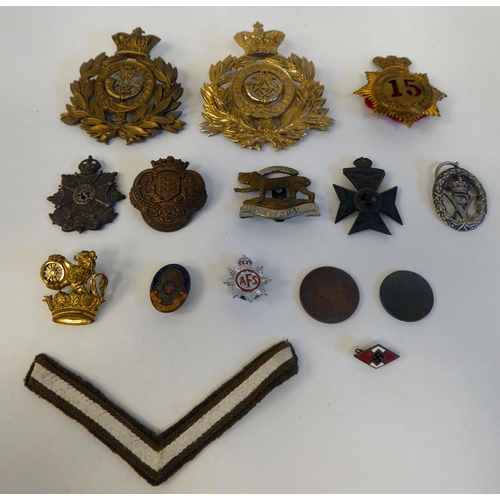 59 - Cast metal and one fabric military themed badges, some copies(Please Note: this lot is subject to th... 