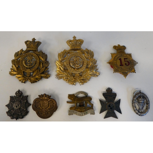 59 - Cast metal and one fabric military themed badges, some copies(Please Note: this lot is subject to th... 