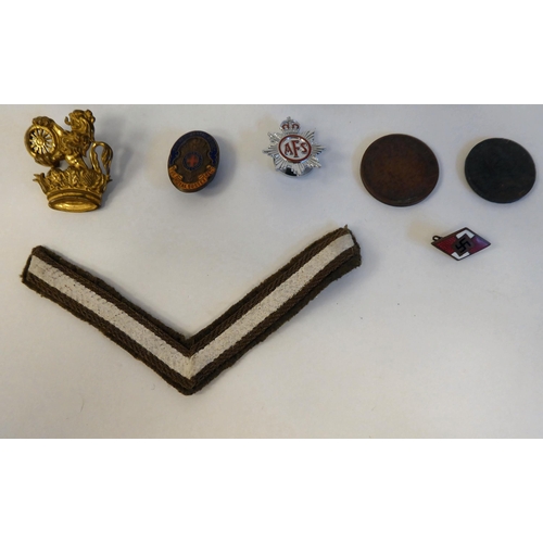 59 - Cast metal and one fabric military themed badges, some copies(Please Note: this lot is subject to th... 