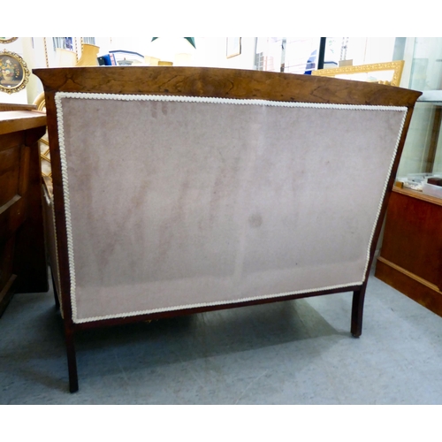 63 - An Edwardian bone inlaid, mahogany showwood framed two person, enclosed settee, raised on square, ta... 